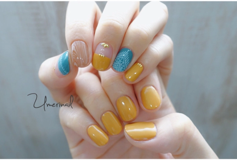 イエローネイルで大人かわいいが叶う♡映える旬の華やかデザイン